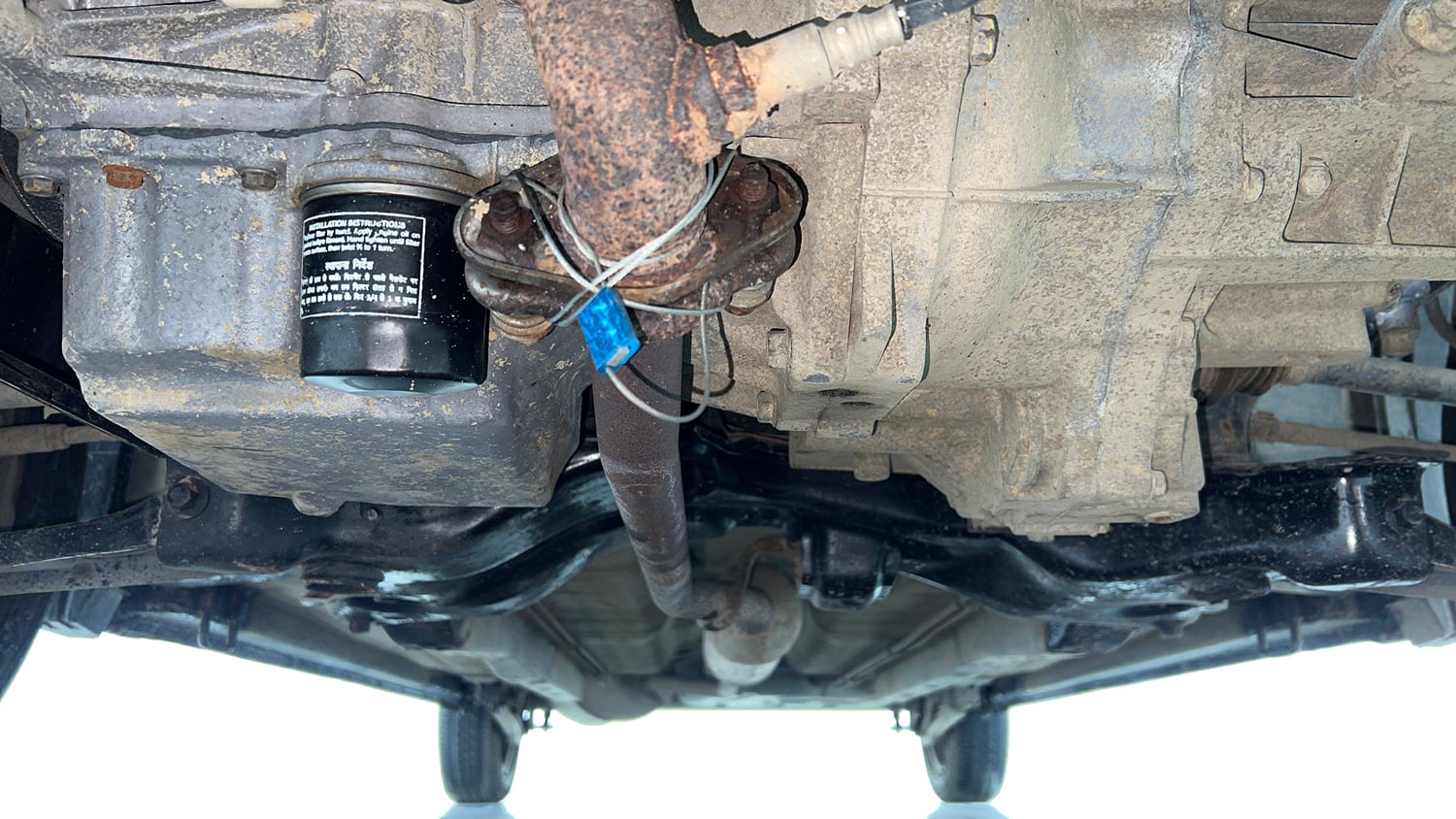 Used 2013 Maruti Suzuki Wagon R VXI Petrol Manual extra FRONT LEFT UNDERBODY VIEW