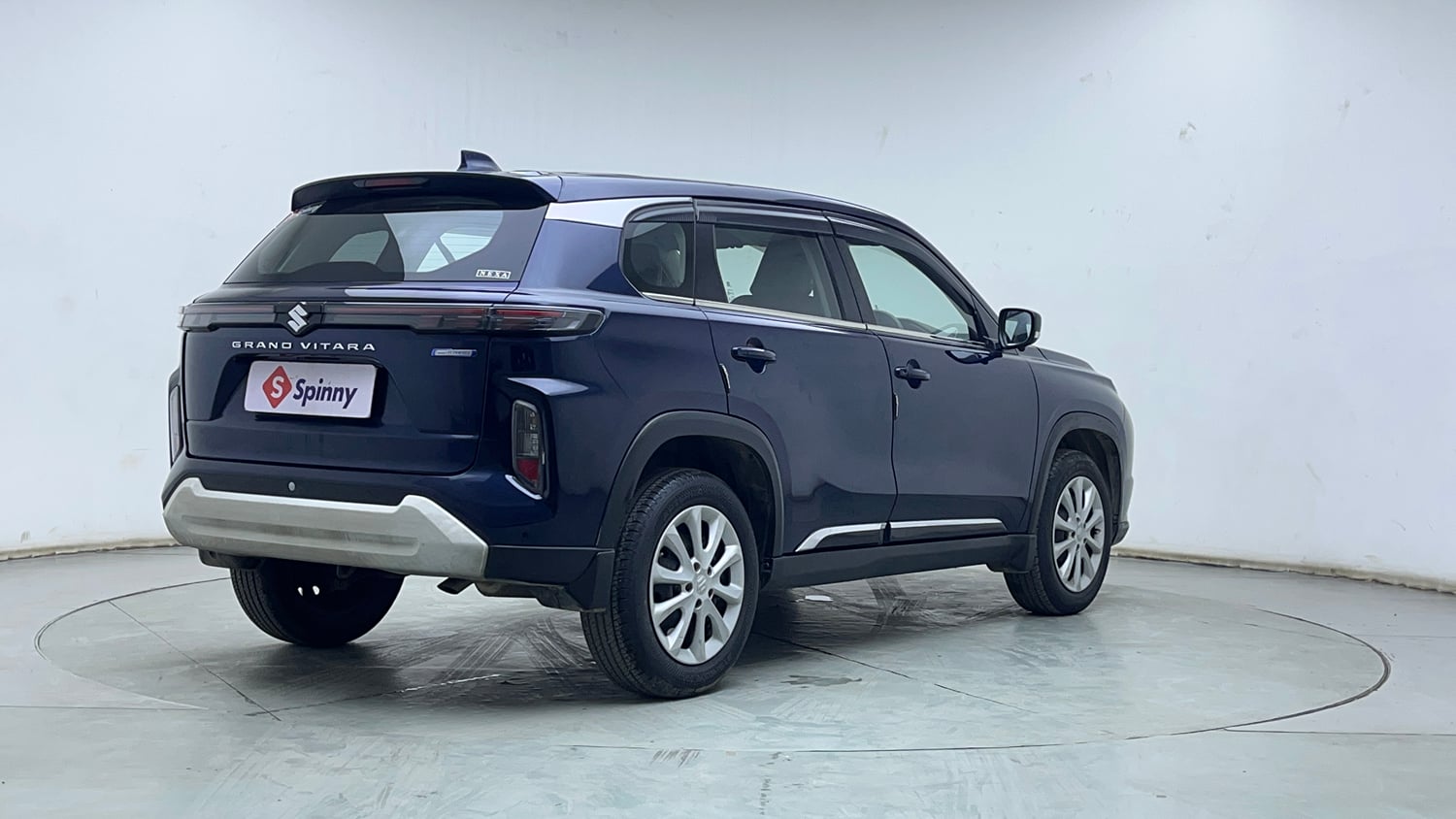 Used 2024 Maruti Suzuki Grand Vitara Sigma Smart Hybrid Petrol Manual exterior RIGHT REAR CORNER VIEW
