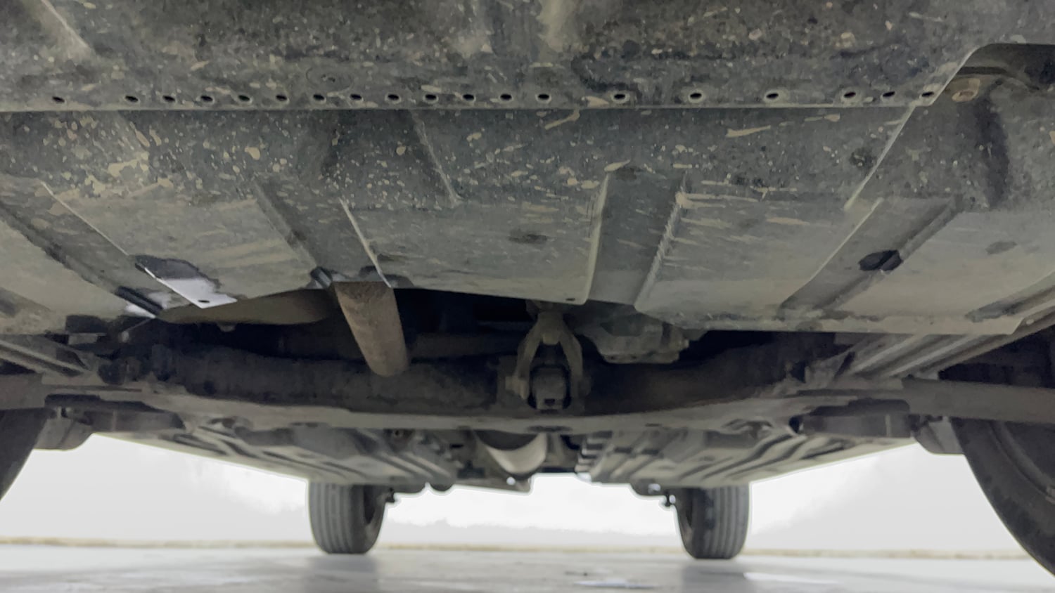 Used 2024 Maruti Suzuki Grand Vitara Sigma Smart Hybrid Petrol Manual extra FRONT LEFT UNDERBODY VIEW