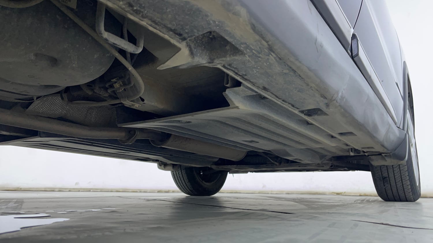 Used 2024 Maruti Suzuki Grand Vitara Sigma Smart Hybrid Petrol Manual extra REAR RIGHT UNDERBODY VIEW