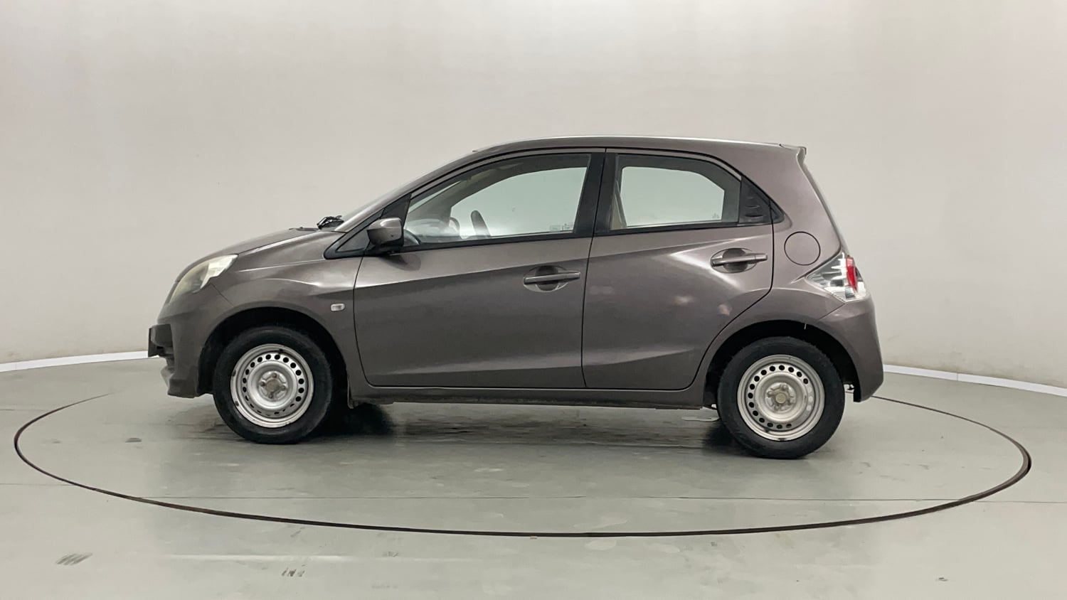 Used 2013 Honda Brio E MT Petrol Manual exterior LEFT SIDE VIEW