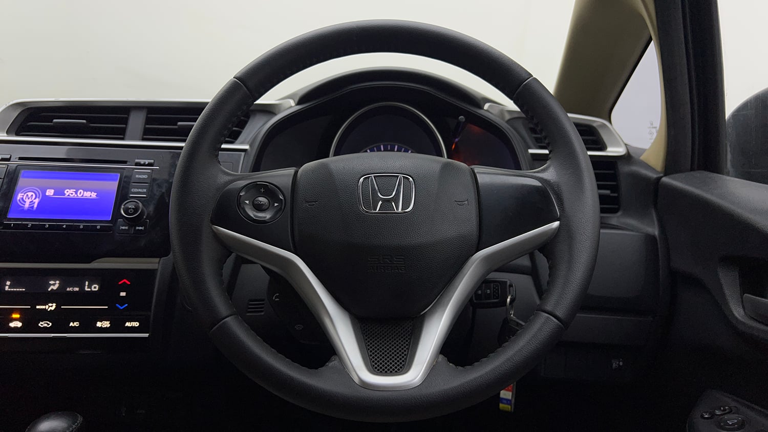Used 2016 Honda Jazz V AT Petrol Petrol Automatic interior STEERING VIEW