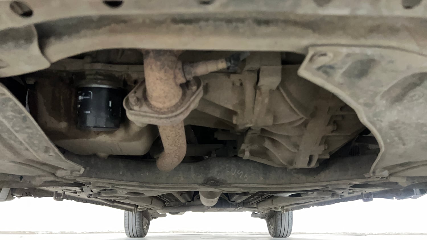 Used 2014 Maruti Suzuki Ertiga ZXi Petrol Manual extra FRONT LEFT UNDERBODY VIEW
