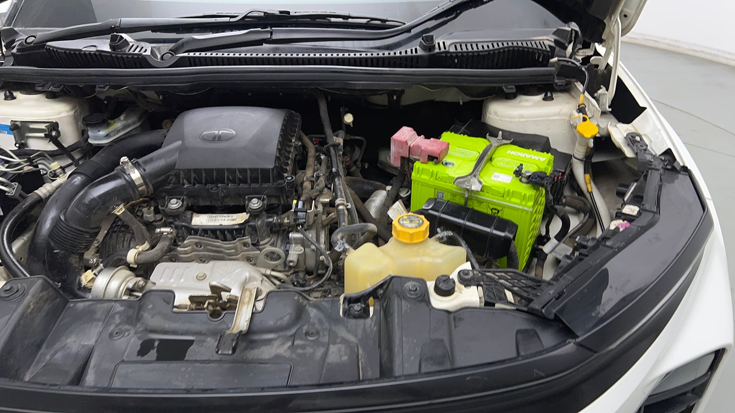 Used 2024 Tata Nexon Creative Plus 1.2 Revotron Petrol 7DCA Petrol Automatic engine ENGINE LEFT SIDE VIEW