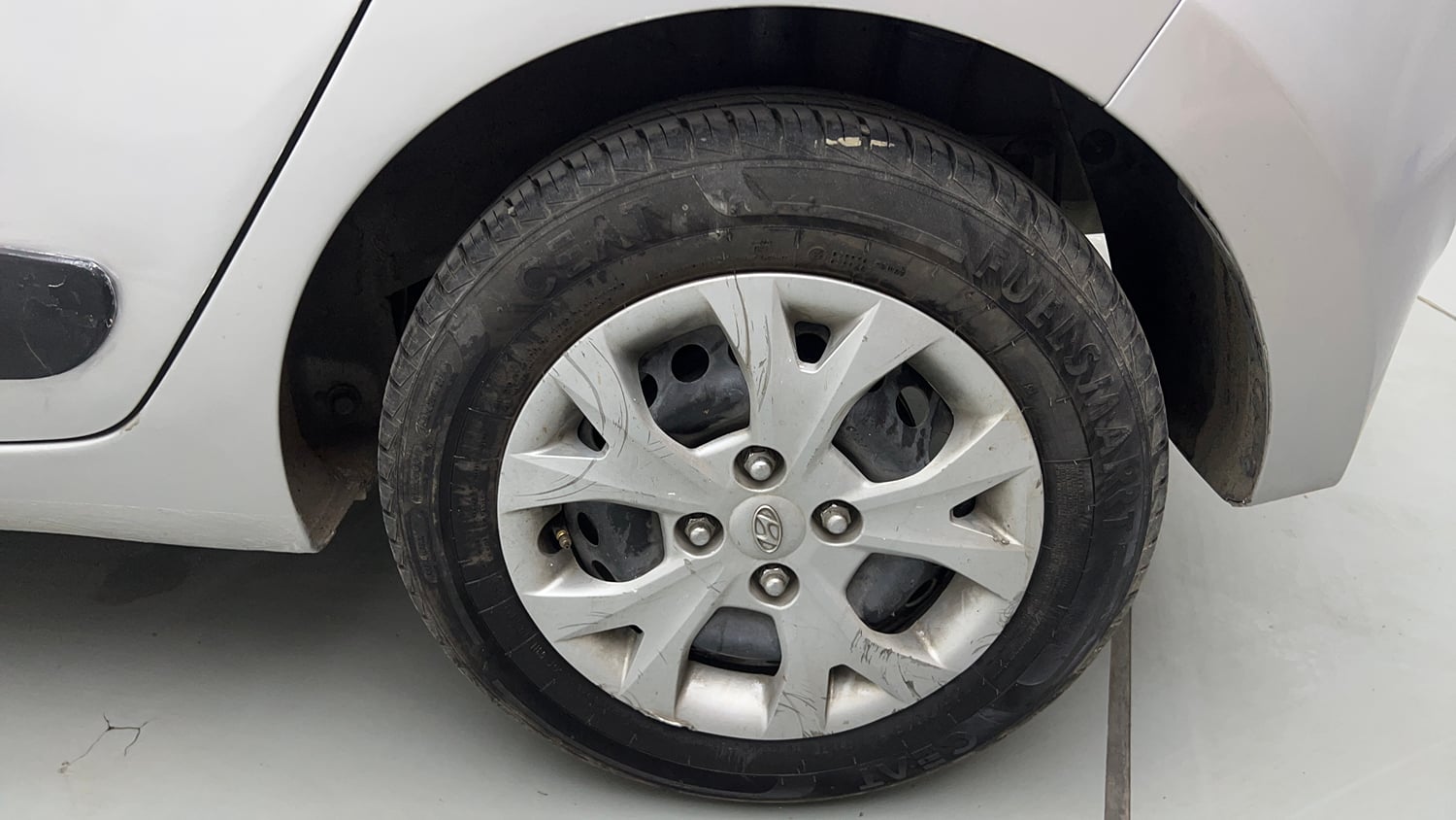 Used 2016 Hyundai Grand i10 Magna 1.2 Kappa VTVT Petrol Manual tyres LEFT REAR TYRE RIM VIEW