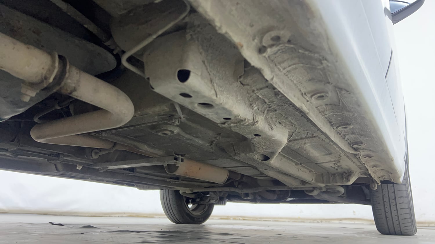 Used 2017 Tata Tiago Revotron XZ Petrol Manual extra REAR RIGHT UNDERBODY VIEW