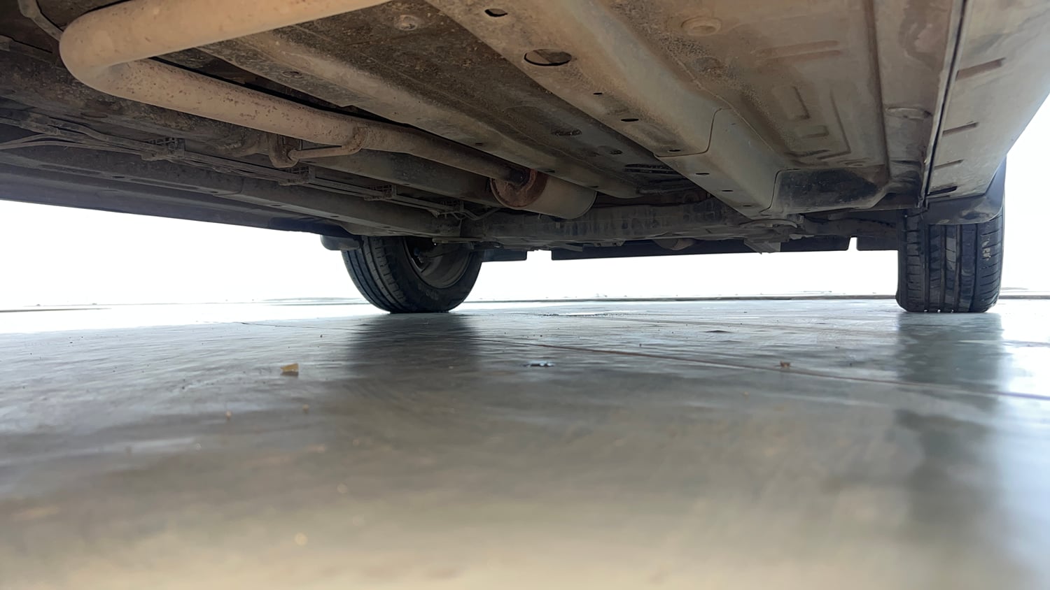 Used 2022 Tata Punch Camo Accomplished Dazzle AMT Petrol Automatic extra REAR RIGHT UNDERBODY VIEW