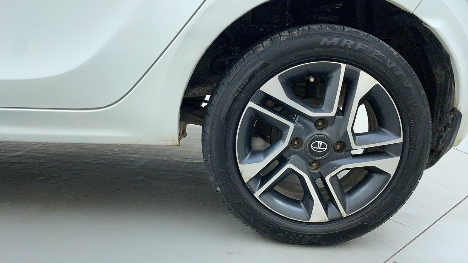 Used 2021 Tata Tiago XZ Plus Dual Tone Petrol Manual tyres LEFT REAR TYRE RIM VIEW