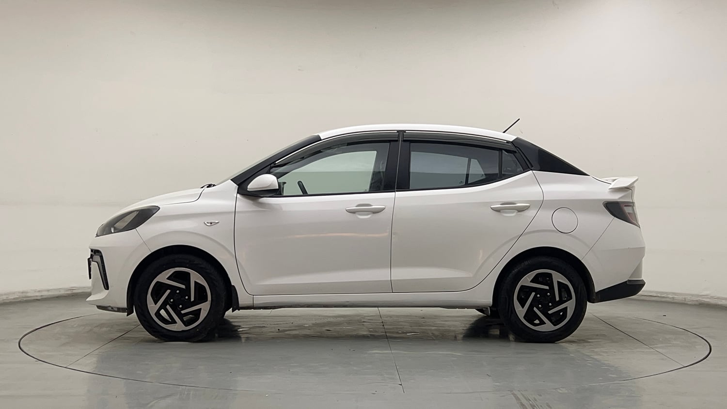 Used 2023 Hyundai Aura S 1.2 CNG Cng Manual exterior LEFT SIDE VIEW
