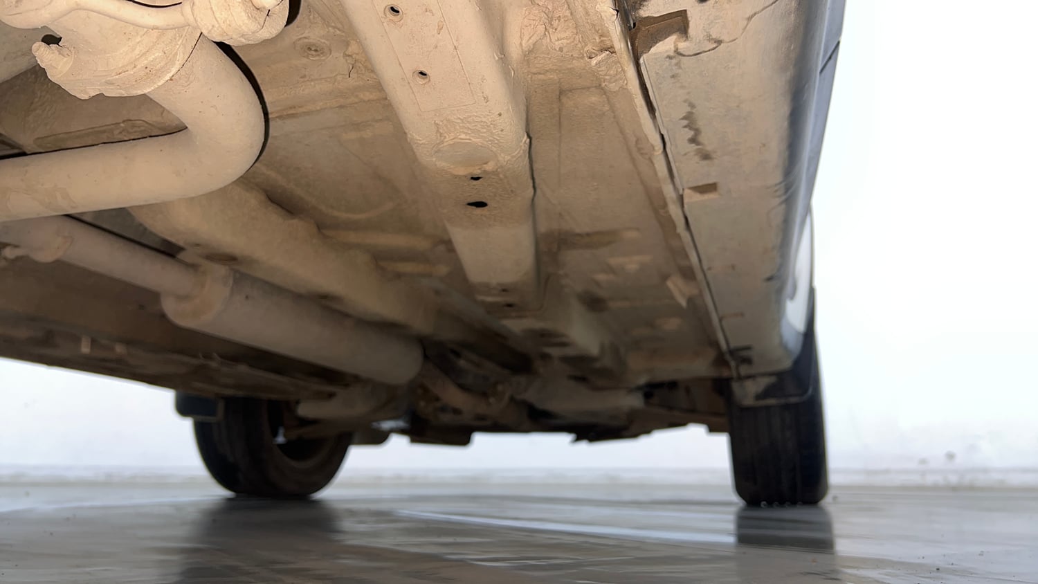 Used 2024 Tata Nexon Creative Plus 1.2 Revotron Petrol 7DCA Petrol Automatic extra REAR RIGHT UNDERBODY VIEW