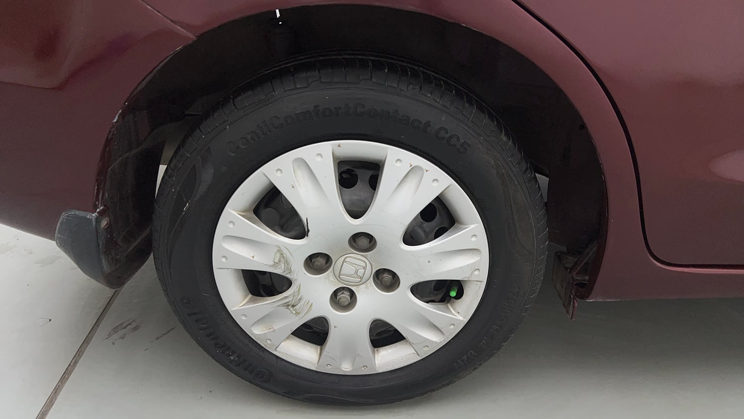 Used 2014 Honda Amaze 1.2 SX i-VTEC Petrol Manual tyres RIGHT REAR TYRE RIM VIEW