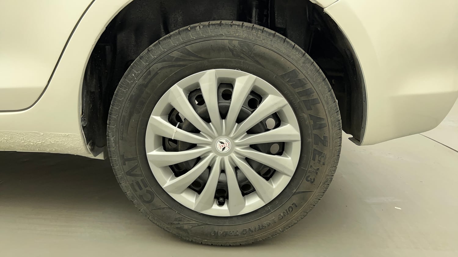 Used 2016 Maruti Suzuki Swift Dzire VXI Petrol Manual tyres LEFT REAR TYRE RIM VIEW