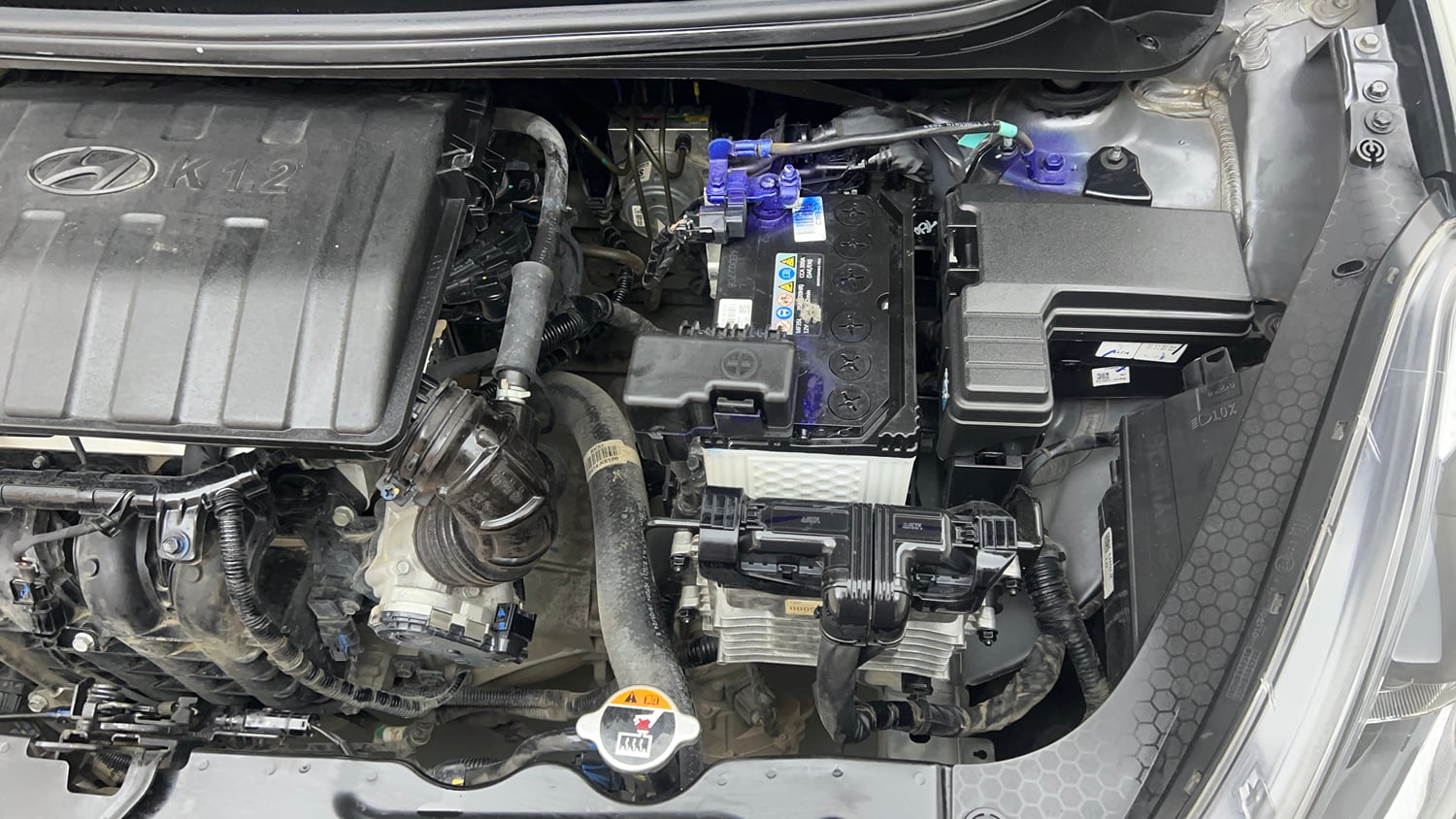 Used 2024 Hyundai Grand i10 Nios Sportz 1.2 Kappa AMT Petrol Automatic engine ENGINE LEFT SIDE VIEW