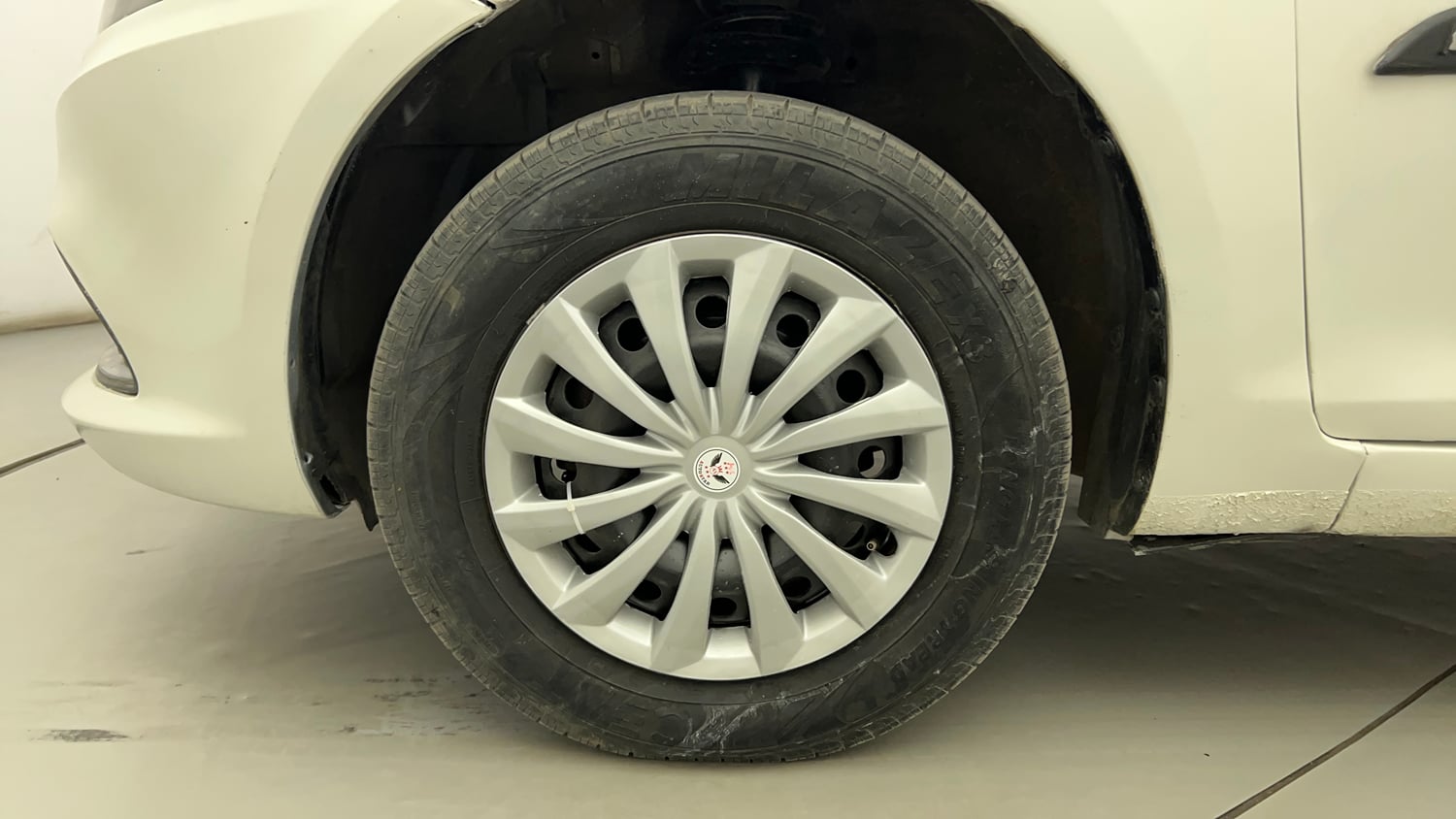 Used 2016 Maruti Suzuki Swift Dzire VXI Petrol Manual tyres LEFT FRONT TYRE RIM VIEW