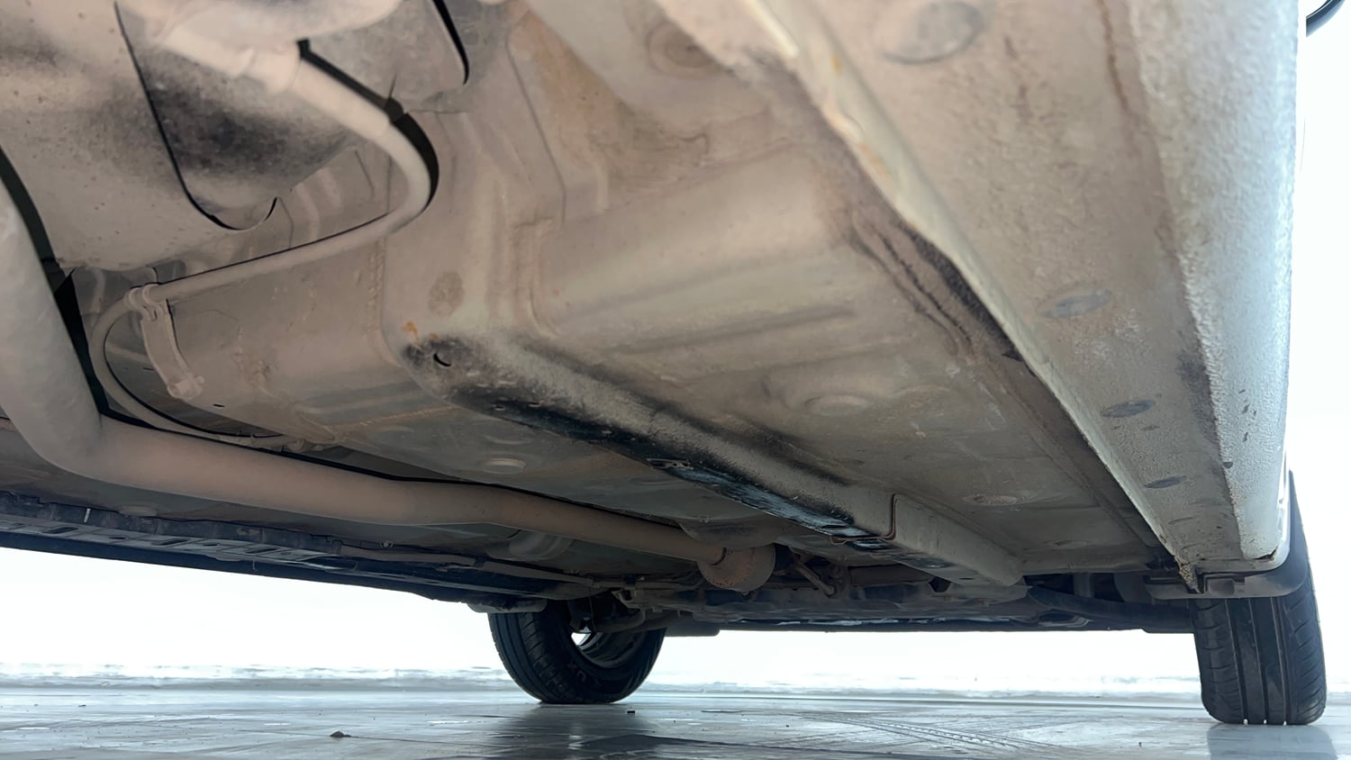 Used 2023 Hyundai Aura S 1.2 CNG Cng Manual extra REAR RIGHT UNDERBODY VIEW