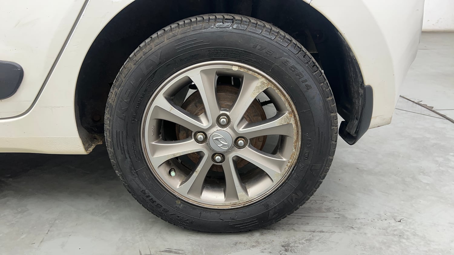 Used 2016 Hyundai Grand i10 Asta 1.2 Kappa VTVT Petrol Manual tyres LEFT REAR TYRE RIM VIEW