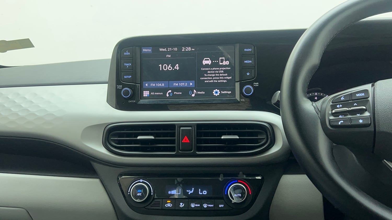 Used 2024 Hyundai Grand i10 Nios Sportz 1.2 Kappa AMT Petrol Automatic top_features Integrated (in-dash) music system