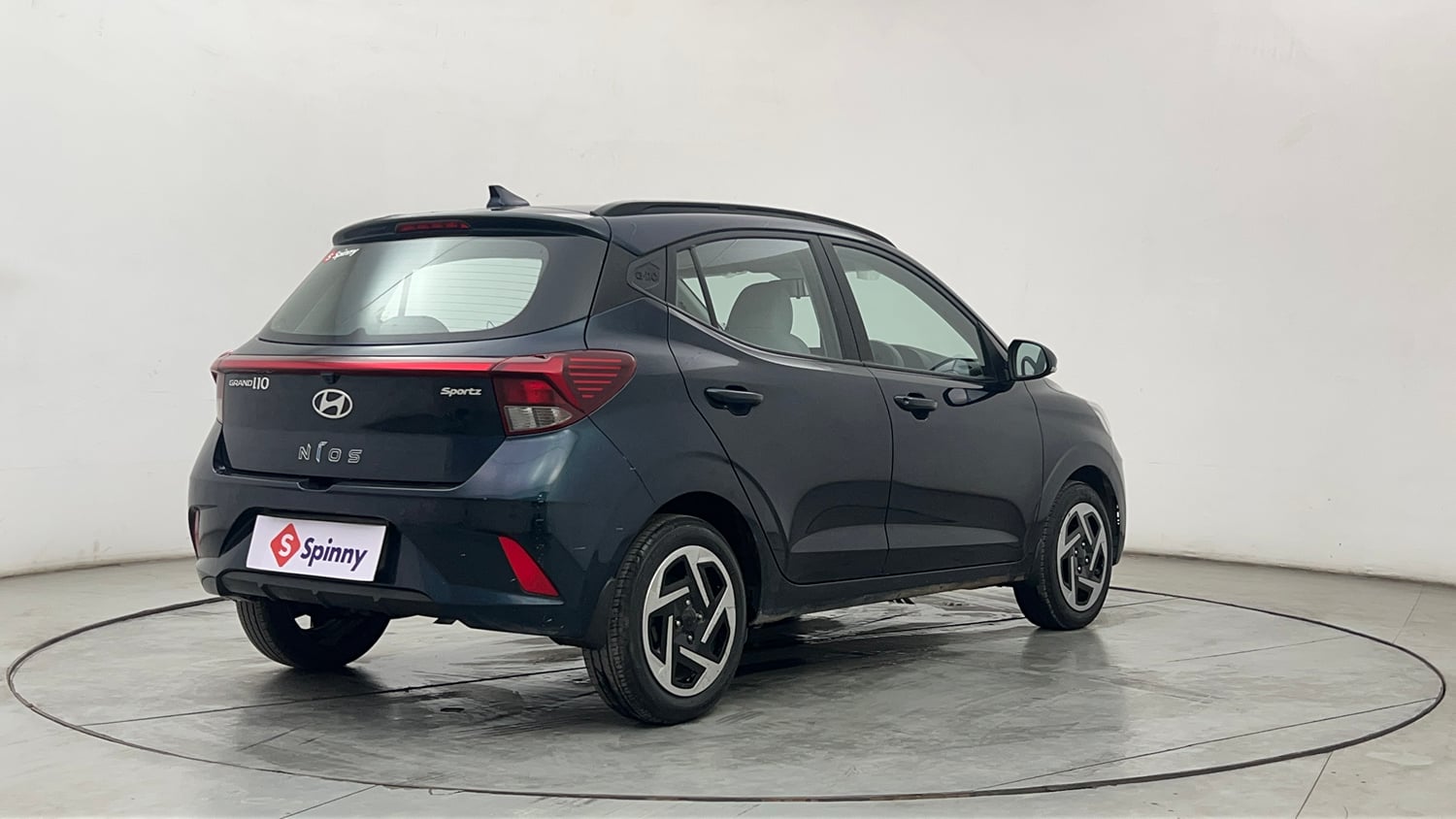 Used 2024 Hyundai Grand i10 Nios Sportz 1.2 Kappa AMT Petrol Automatic exterior RIGHT REAR CORNER VIEW