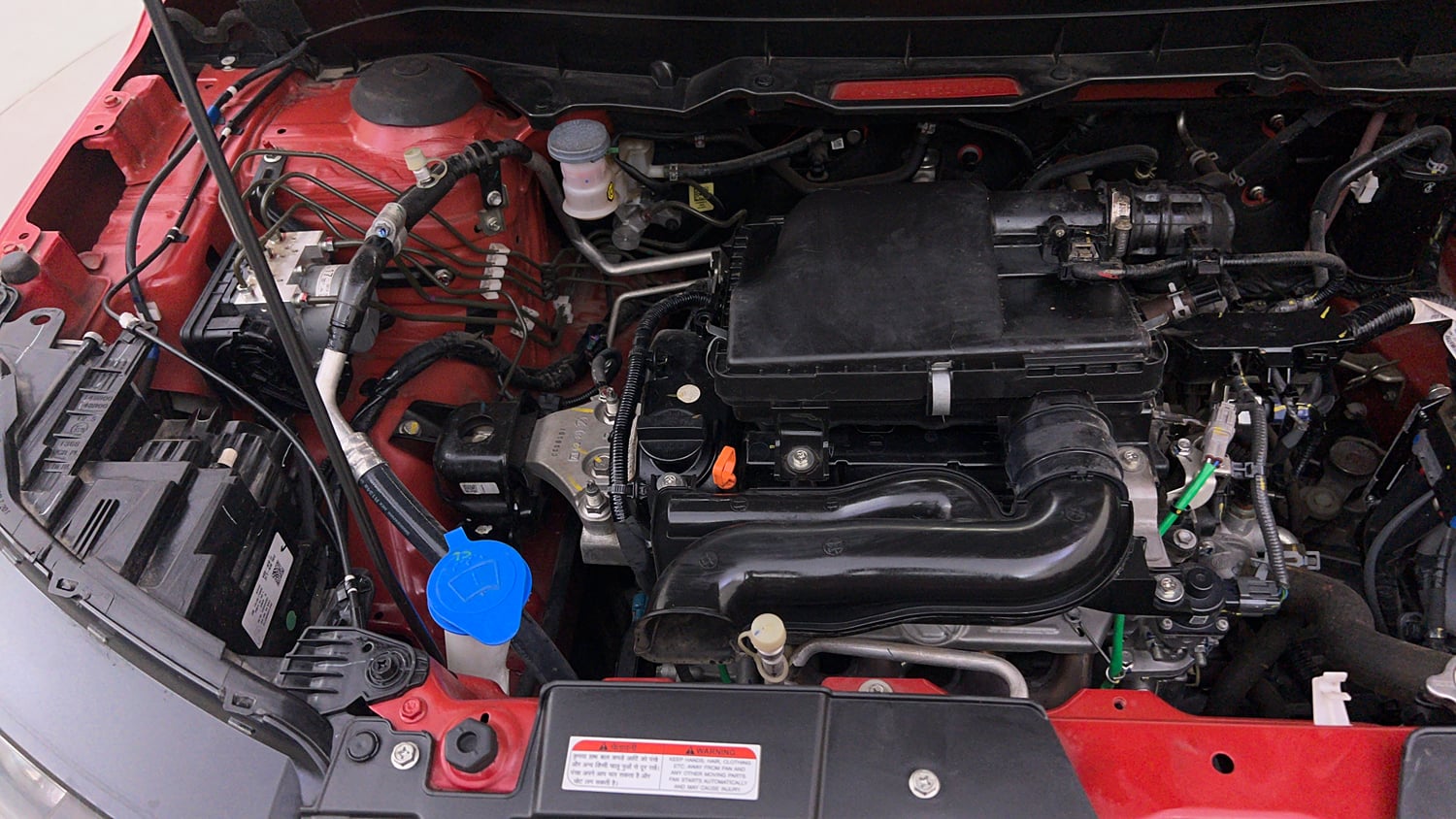 Used 2023 Maruti Suzuki Brezza Zxi Dual Tone Petrol Manual engine ENGINE RIGHT SIDE VIEW
