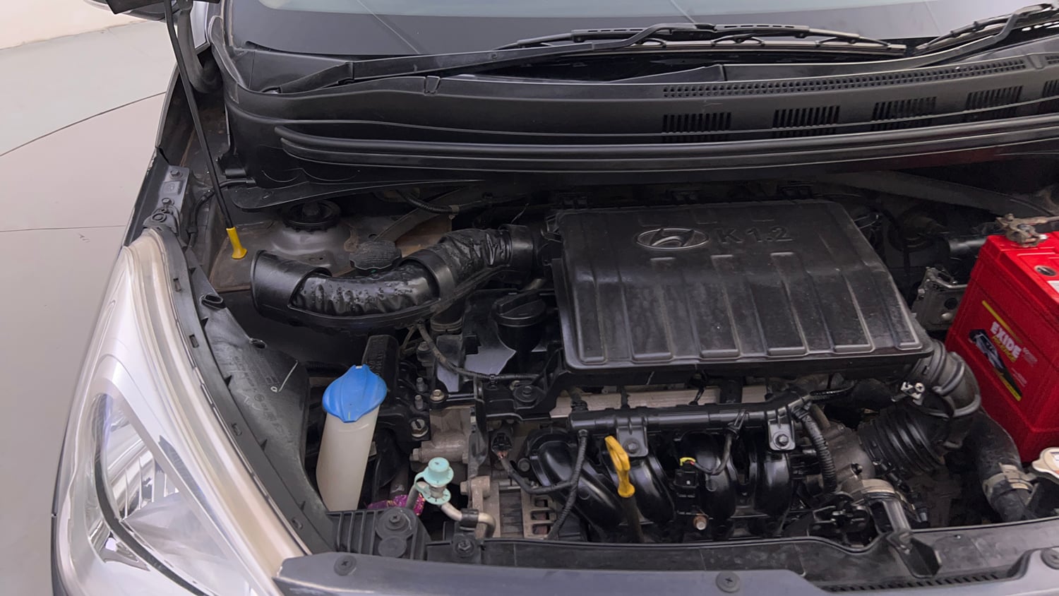 Used 2016 Hyundai Grand i10 Sportz 1.2 Kappa VTVT Petrol Manual engine ENGINE RIGHT SIDE HINGE & APRON VIEW