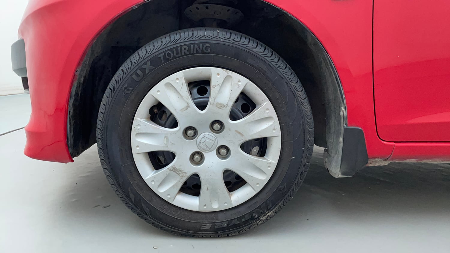 Used 2014 Honda Brio S MT Petrol Manual tyres LEFT FRONT TYRE RIM VIEW