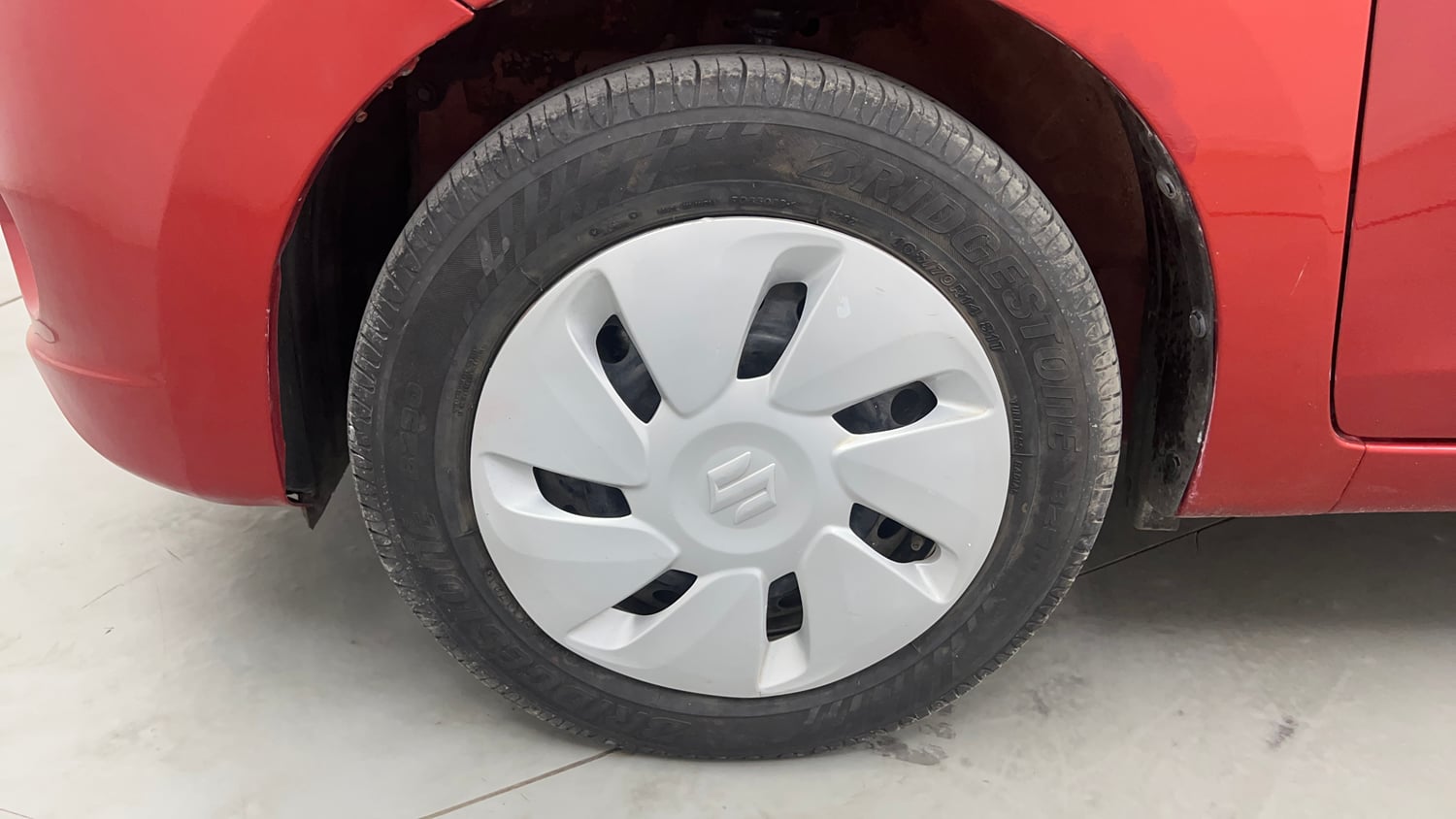 Used 2015 Maruti Suzuki Celerio VXi CNG Cng Manual tyres LEFT FRONT TYRE RIM VIEW