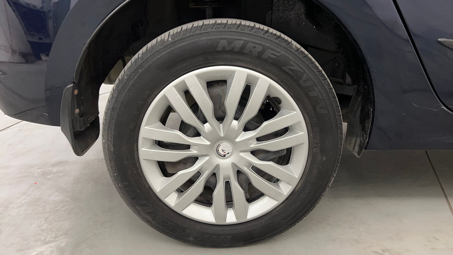 Used 2023 Tata Tigor XZ Plus CNG Cng Manual tyres RIGHT REAR TYRE RIM VIEW