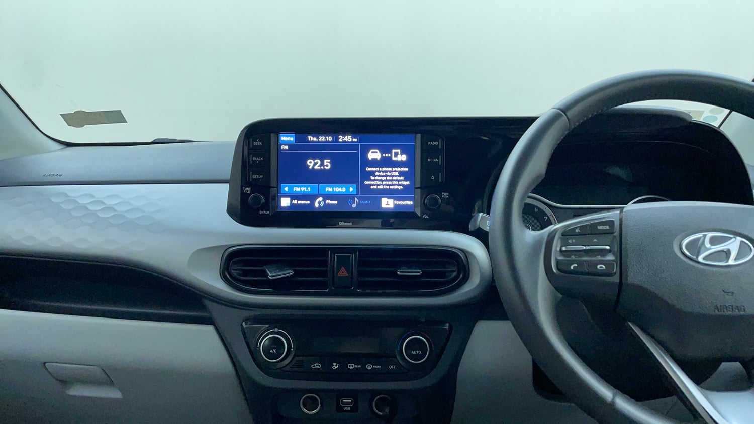 Used 2021 Hyundai Grand i10 Nios Asta AMT 1.2 Kappa VTVT Petrol Automatic interior MUSIC SYSTEM & AC CONTROL VIEW