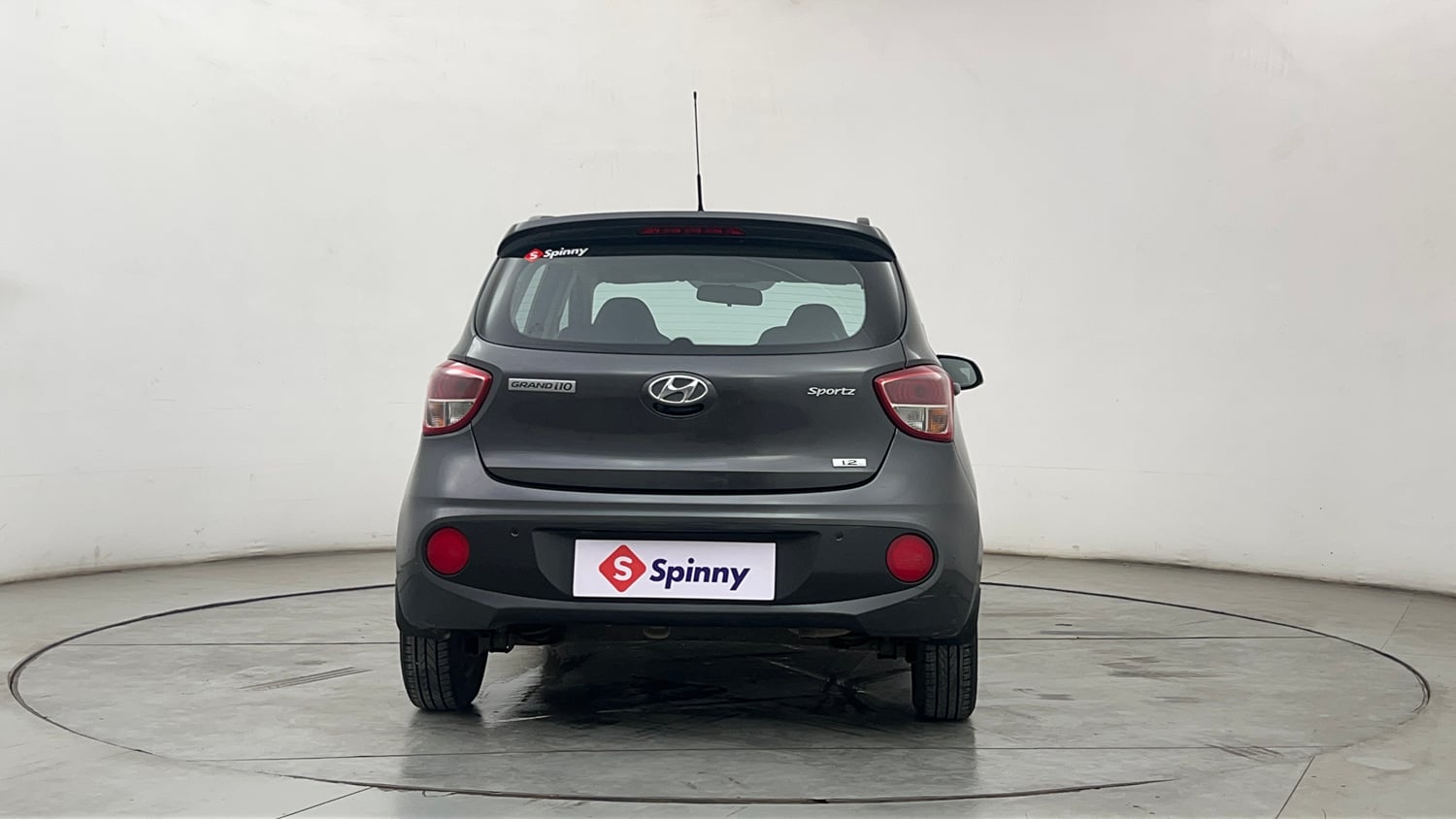 Used 2019 Hyundai Grand i10 Sportz 1.2 Kappa VTVT Petrol Manual exterior BACK VIEW