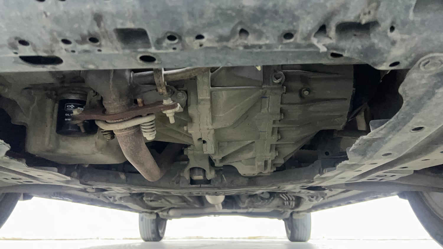 Used 2024 Maruti Suzuki XL6 Zeta MT Petrol Petrol Manual extra FRONT LEFT UNDERBODY VIEW