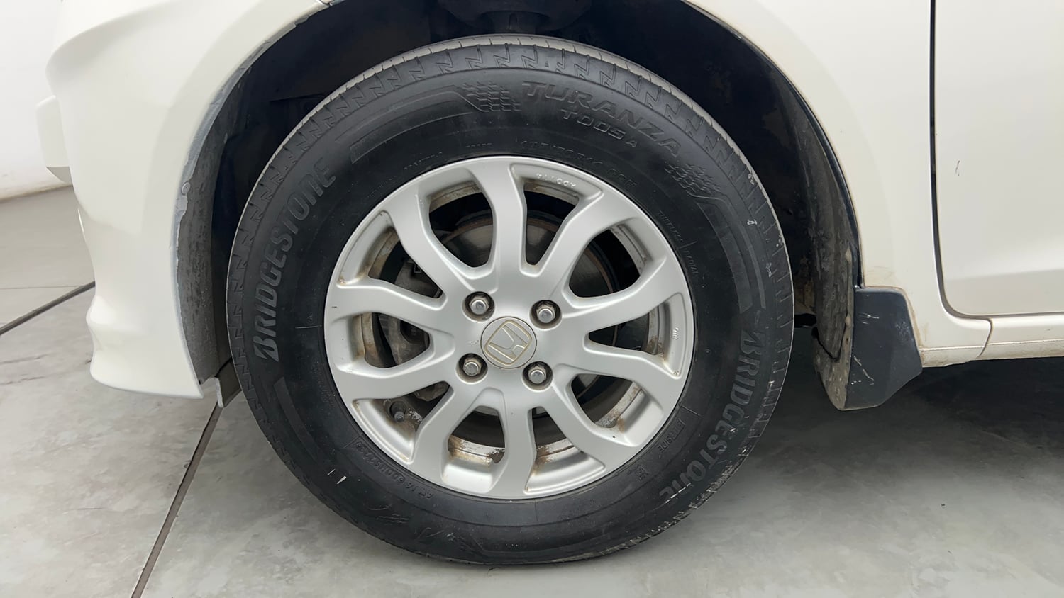 Used 2014 Honda Amaze 1.2 VX AT i-VTEC Petrol Automatic tyres LEFT FRONT TYRE RIM VIEW