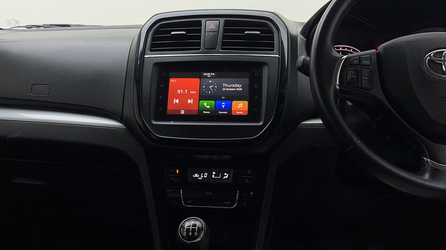 Used 2022 Toyota Urban Cruiser Premium Grade MT Petrol Manual interior MUSIC SYSTEM & AC CONTROL VIEW