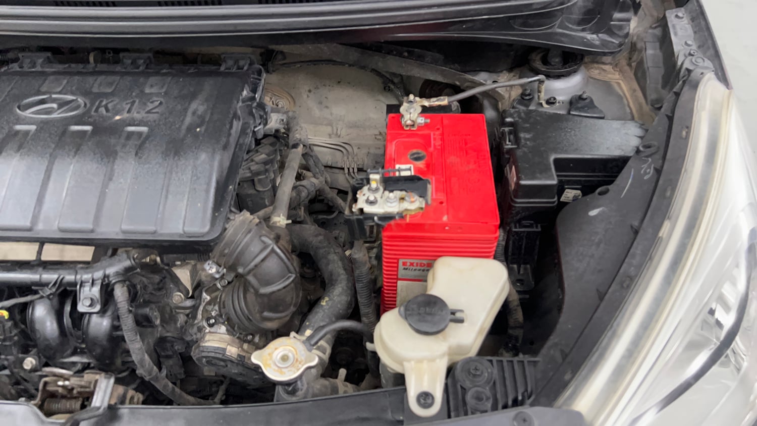 Used 2016 Hyundai Grand i10 Sportz 1.2 Kappa VTVT Petrol Manual engine ENGINE LEFT SIDE VIEW