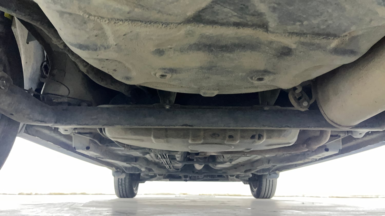Used 2023 Tata Tigor XZ Plus Petrol Manual extra REAR UNDERBODY VIEW (TAKEN FROM REAR)
