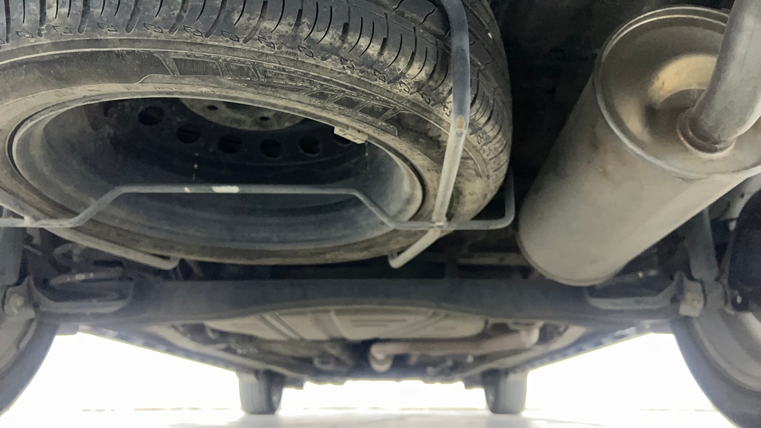 Used 2024 Maruti Suzuki XL6 Zeta MT Petrol Petrol Manual extra REAR UNDERBODY VIEW (TAKEN FROM REAR)