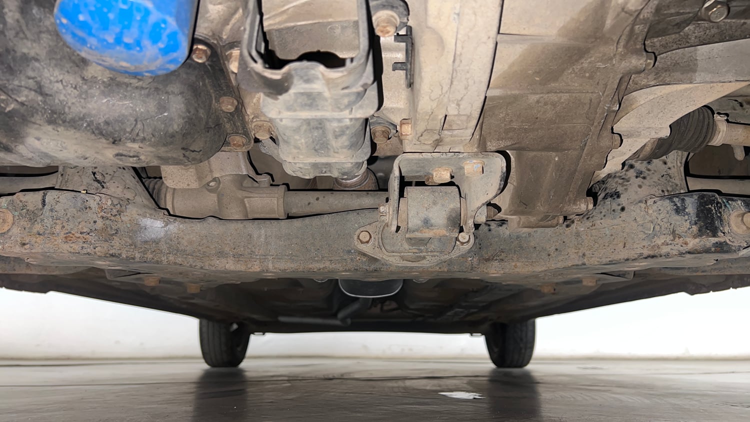 Used 2015 Hyundai Grand i10 Sportz 1.2 Kappa VTVT Petrol Manual extra FRONT LEFT UNDERBODY VIEW