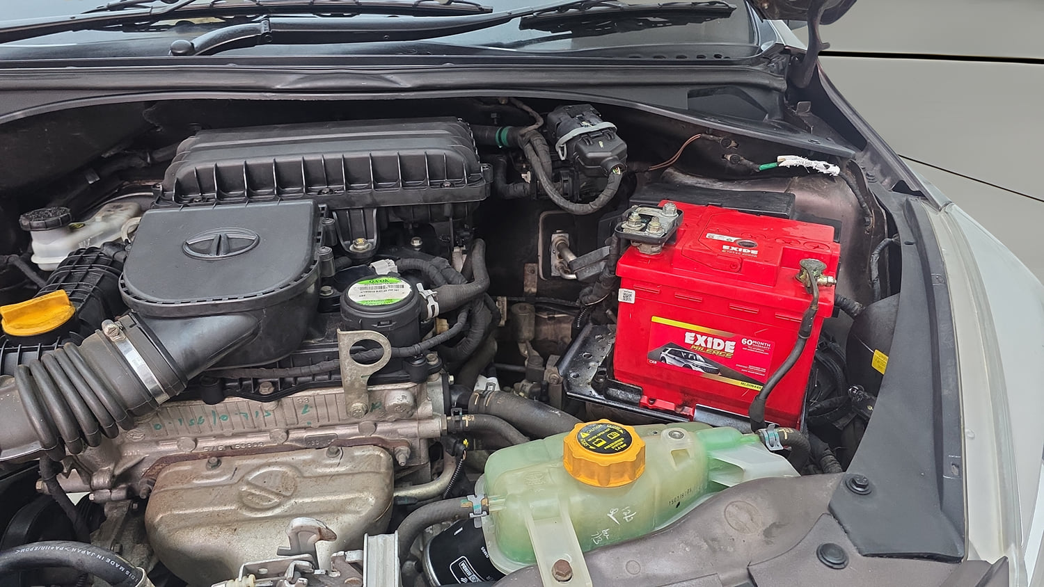 Used 2019 Tata Tiago Revotron XT Petrol Manual engine ENGINE LEFT SIDE HINGE & APRON VIEW