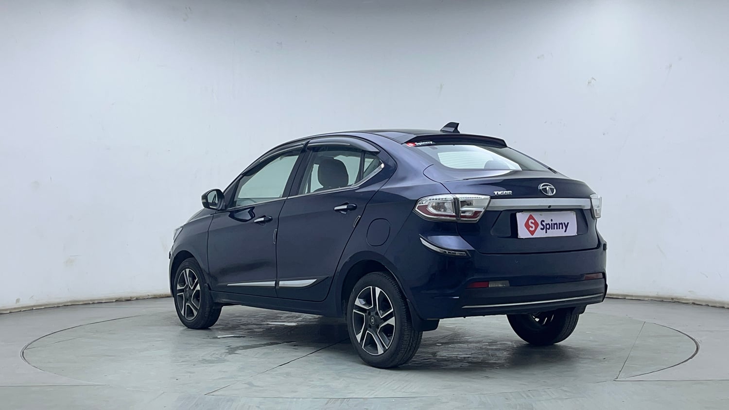 Used 2023 Tata Tigor XZ Plus Petrol Manual exterior LEFT REAR CORNER VIEW