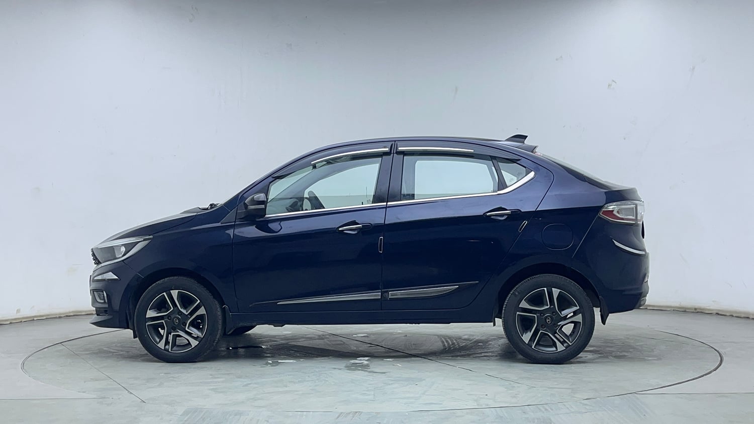 Used 2023 Tata Tigor XZ Plus Petrol Manual exterior LEFT SIDE VIEW