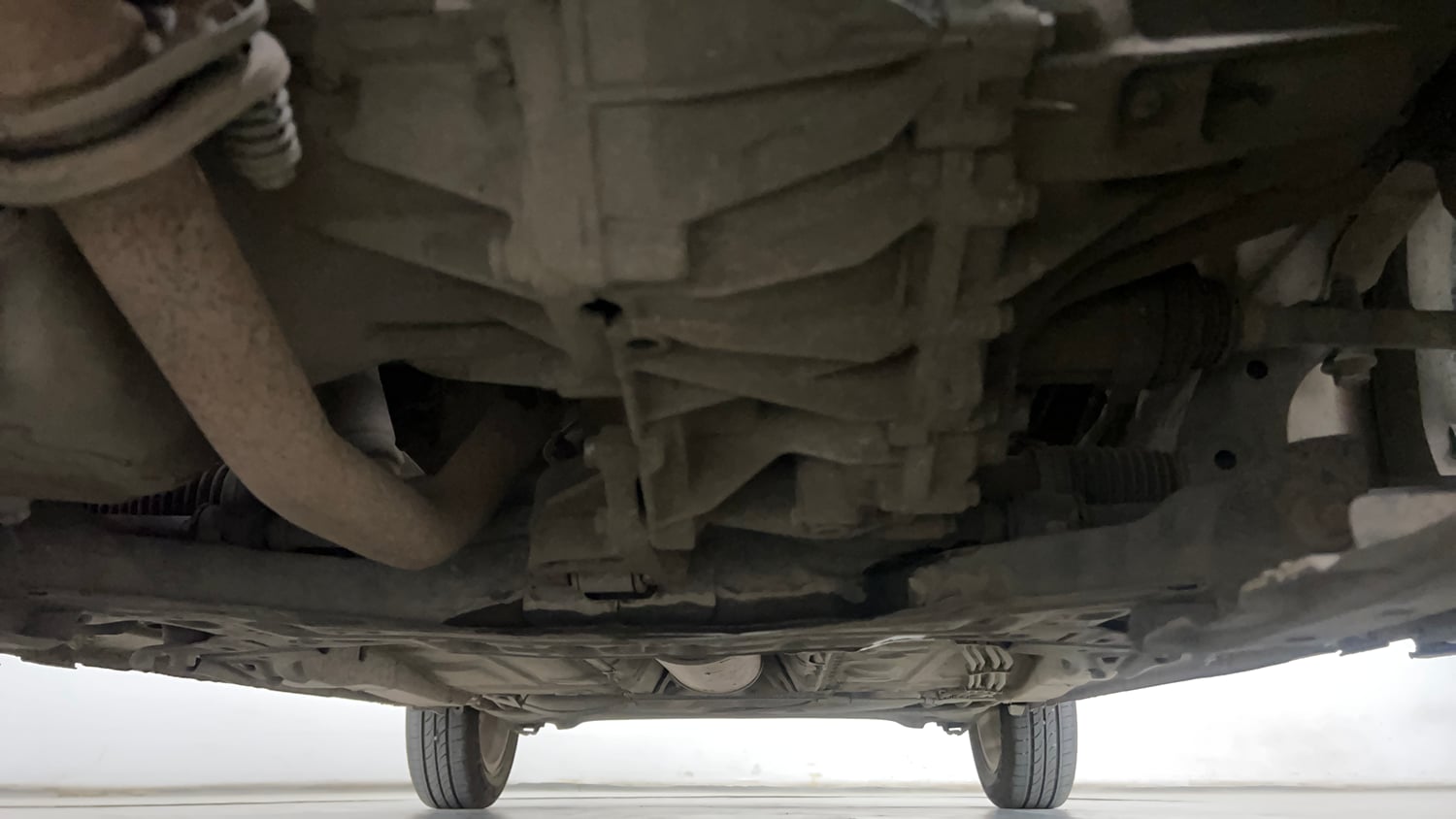 Used 2020 Maruti Suzuki Dzire ZXi AMT Petrol Automatic extra FRONT LEFT UNDERBODY VIEW