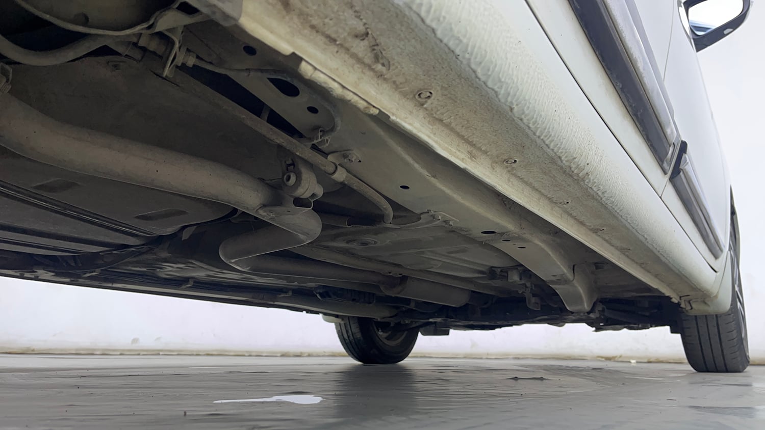 Used 2023 Maruti Suzuki Ertiga ZXi Plus AT Petrol Automatic extra REAR RIGHT UNDERBODY VIEW