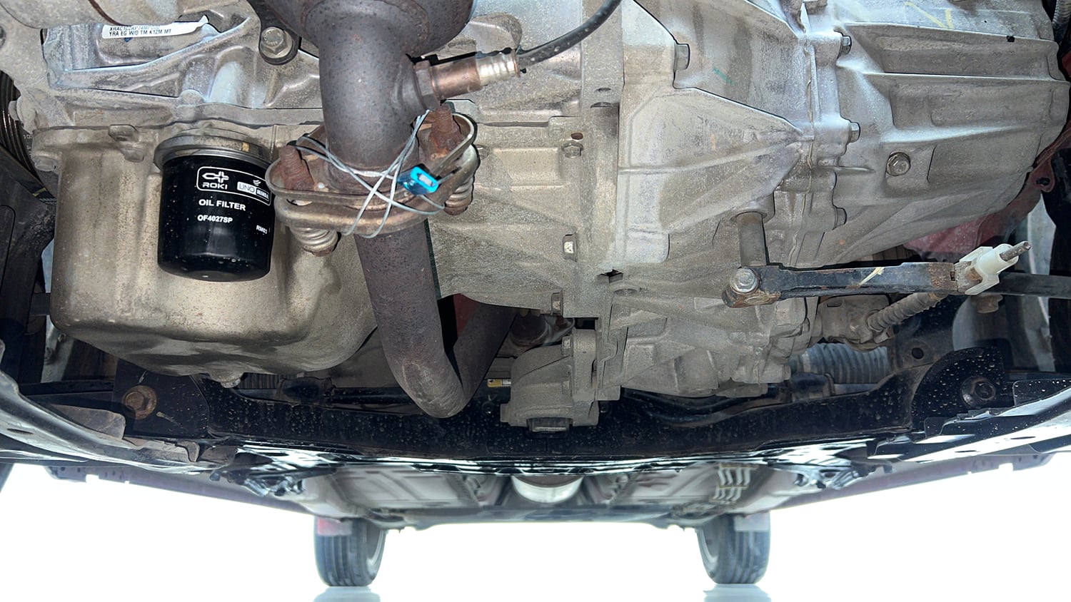 Used 2016 Maruti Suzuki Baleno Zeta 1.2 Petrol Manual extra FRONT LEFT UNDERBODY VIEW