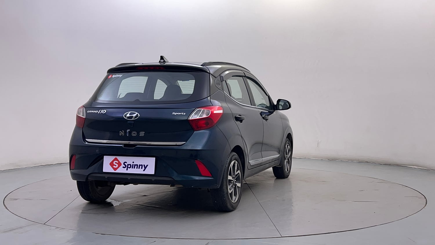 Used 2021 Hyundai Grand i10 Nios Sportz 1.2 Kappa VTVT Dual Tone Petrol Manual exterior RIGHT REAR CORNER VIEW