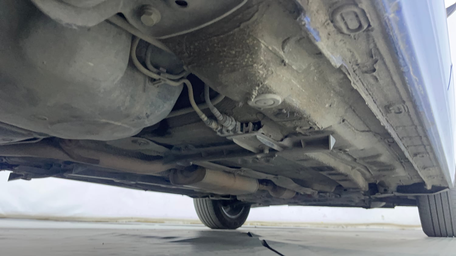 Used 2023 Volkswagen Virtus Topline 1.0 TSI AT Petrol Automatic extra REAR RIGHT UNDERBODY VIEW