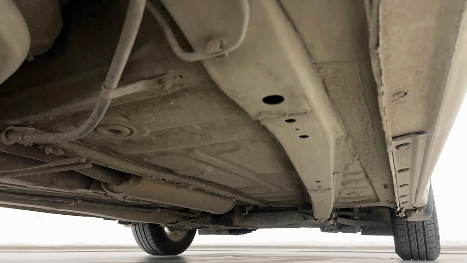 Used 2020 Maruti Suzuki Dzire ZXi AMT Petrol Automatic extra REAR RIGHT UNDERBODY VIEW