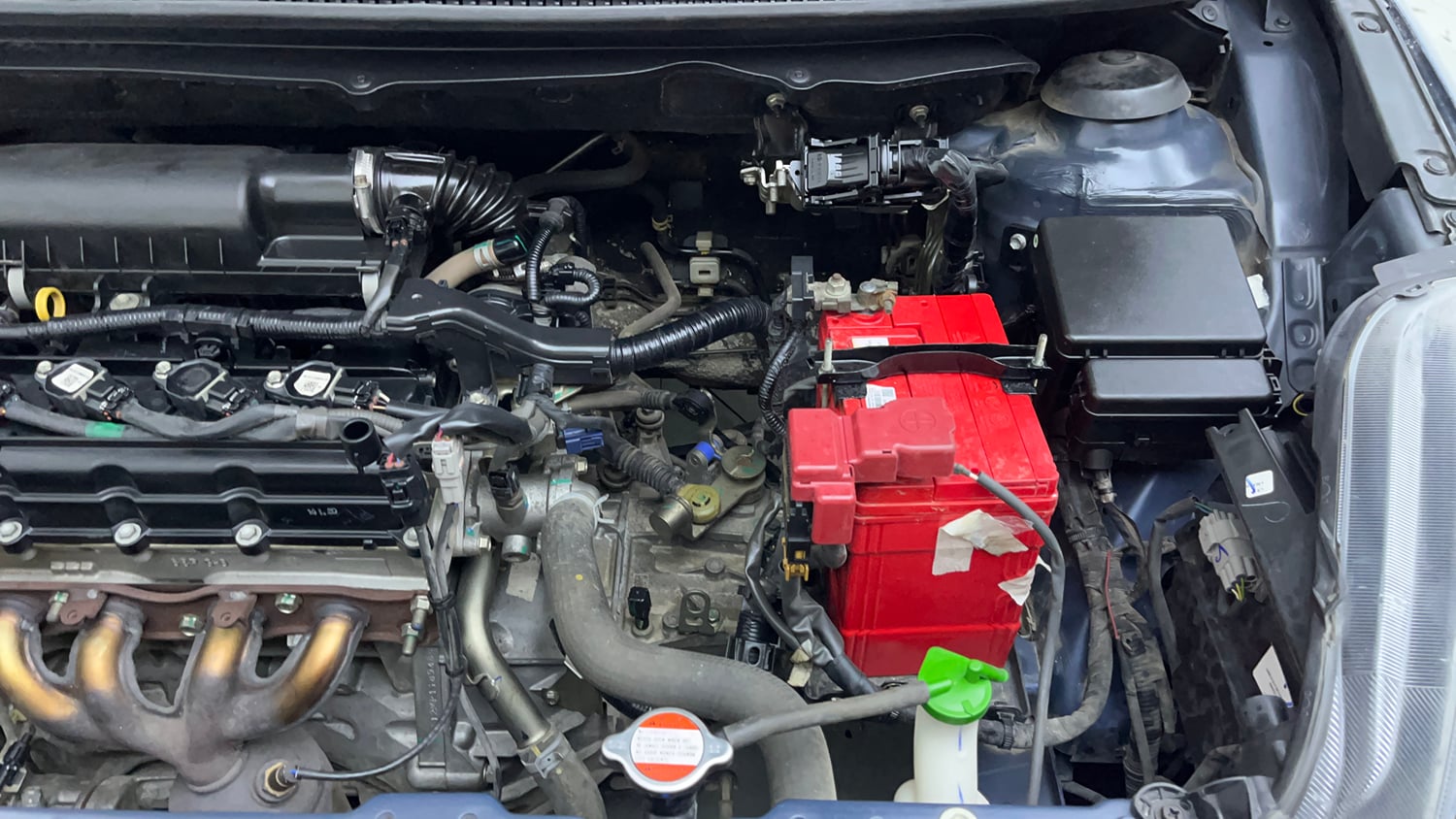 Used 2020 Maruti Suzuki Baleno Delta Petrol Manual engine ENGINE LEFT SIDE VIEW