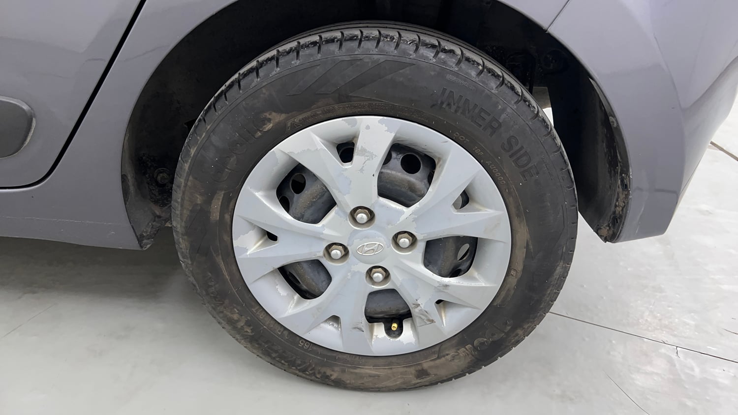 Used 2016 Hyundai Grand i10 Sportz 1.2 Kappa VTVT Petrol Manual tyres LEFT REAR TYRE RIM VIEW
