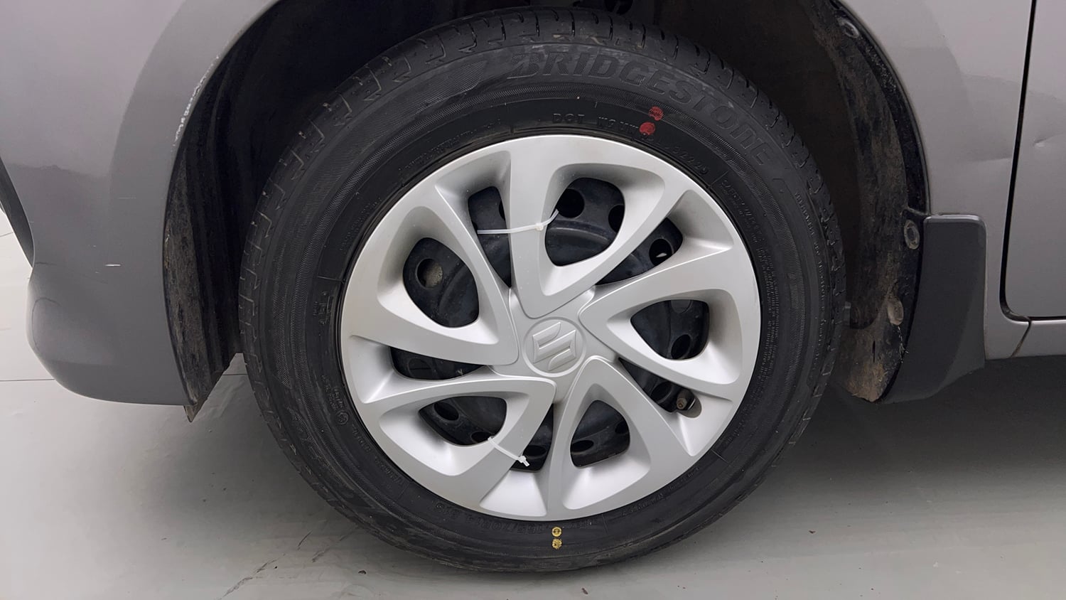Used 2022 Maruti Suzuki Celerio ZXi Petrol Manual tyres LEFT FRONT TYRE RIM VIEW