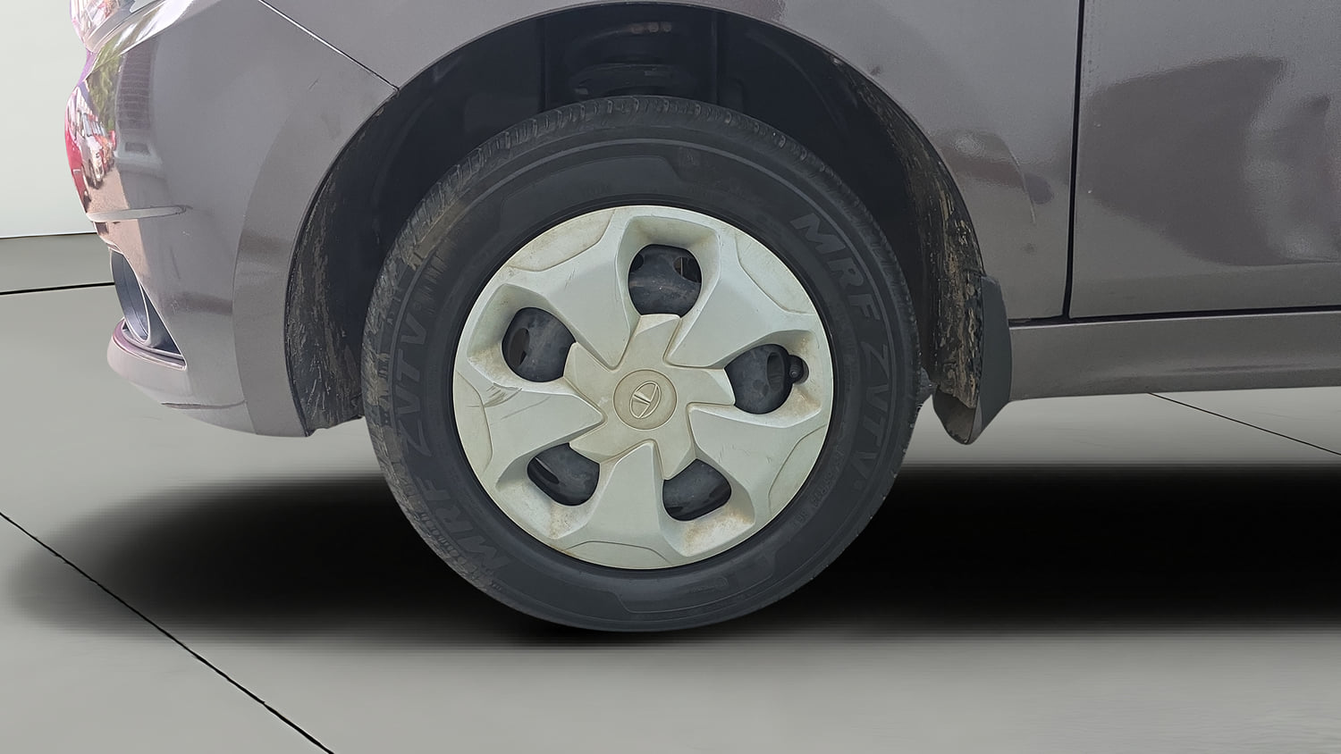 Used 2019 Tata Tiago Revotron XT Petrol Manual tyres LEFT FRONT TYRE RIM VIEW