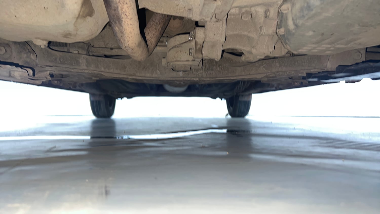 Used 2016 Maruti Suzuki Baleno Delta 1.2 AT Petrol Automatic extra FRONT LEFT UNDERBODY VIEW